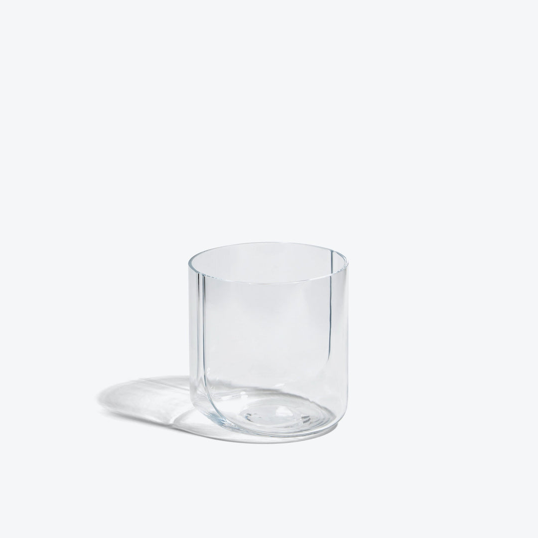 Hew Tumbler, Set of 4 — single Clear glass tumbler, three-quarter view on a white background
