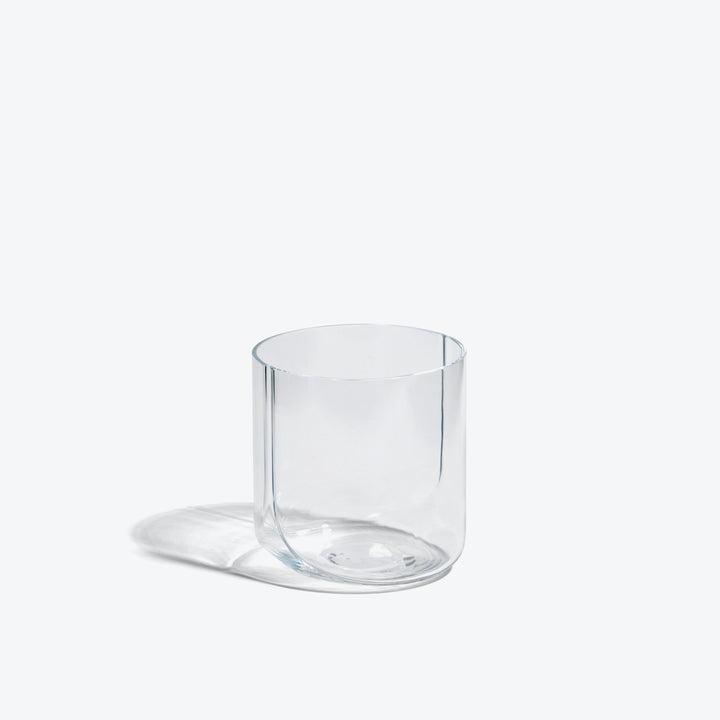 Hew Tumbler, Set of 4 — single Clear glass tumbler, three-quarter view on a white background