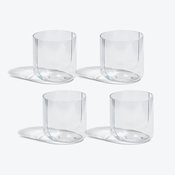 Hew Tumbler, Set of 4 — four Clear glass tumblers arranged in two rows on white