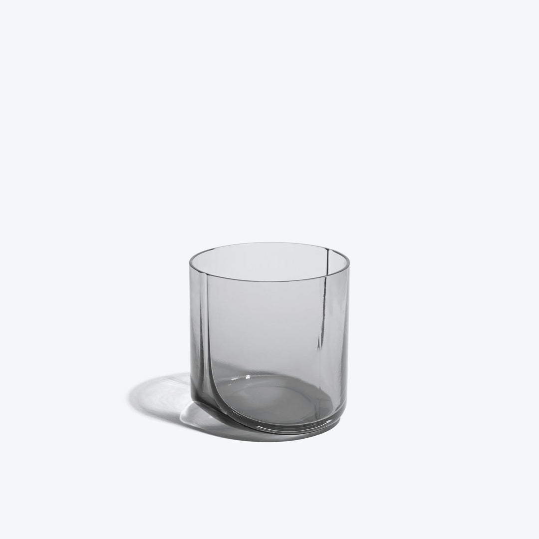 Hew Tumbler, Set of 4 — single Smoke glass tumbler, three-quarter view on a white background