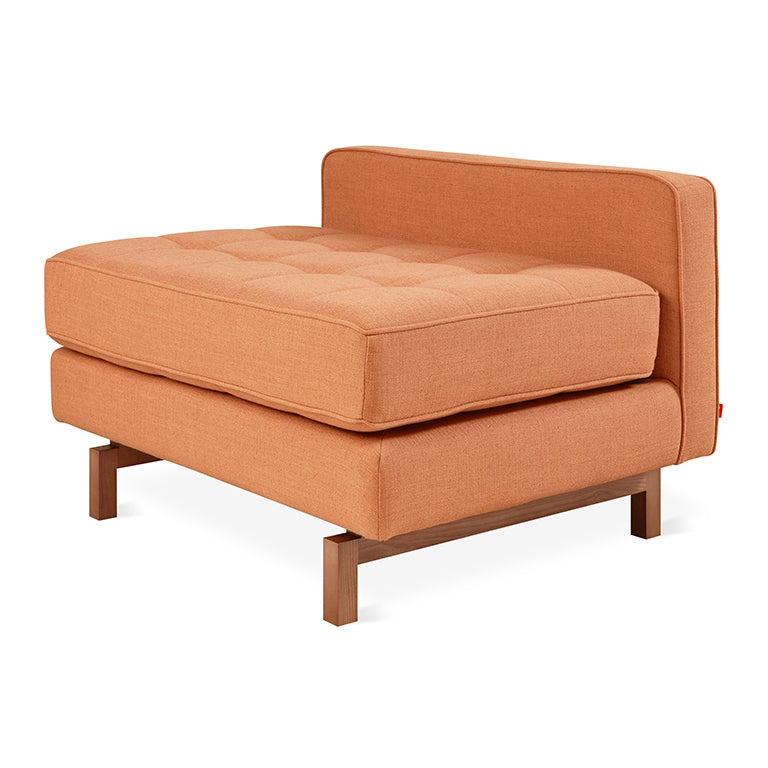 Tufted orange chaise lounge with walnut legs, modern designer furniture