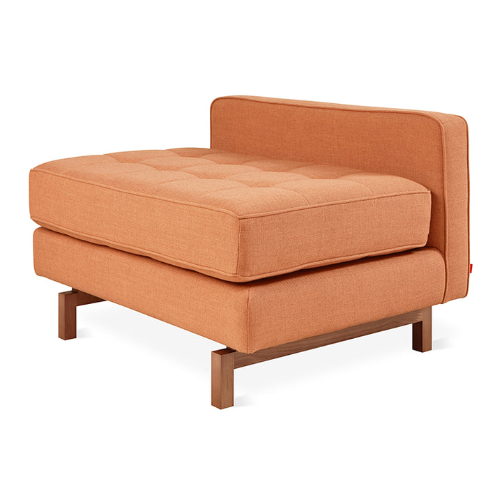 Tufted orange chaise lounge with walnut legs, modern designer furniture
