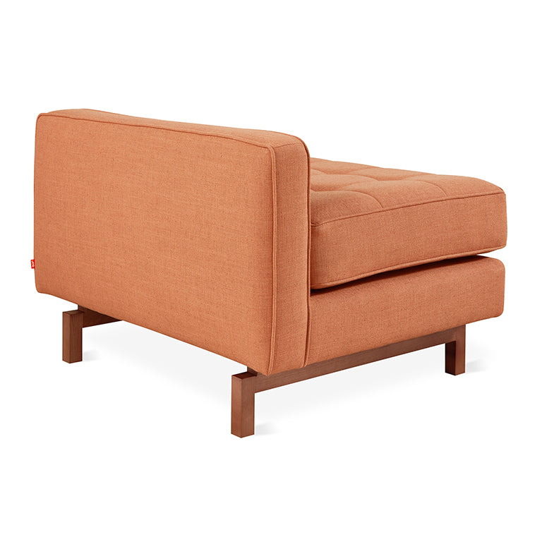 Mid-century modern chaise lounge in terracotta linen with walnut wood base, designer-inspired comfort