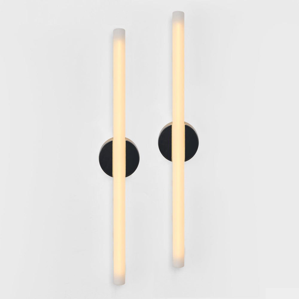 Modern wall sconces with frosted glass and matte black mounts, minimalist design