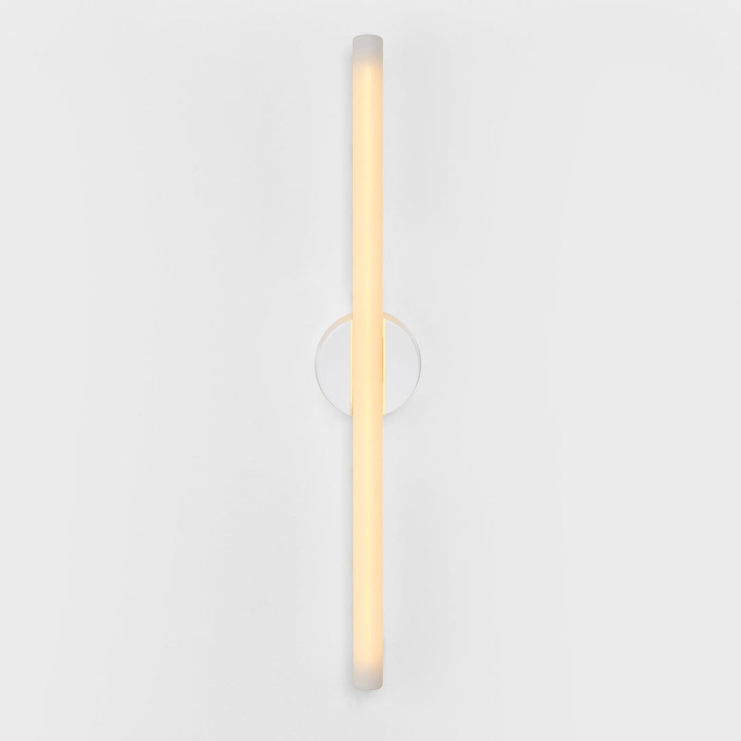 Modern frosted glass wall sconce with minimalist circular mount, elegant ambient lighting design