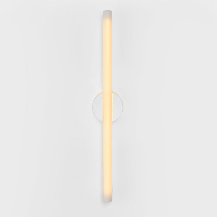 Modern frosted glass wall sconce with minimalist circular mount, elegant ambient lighting design