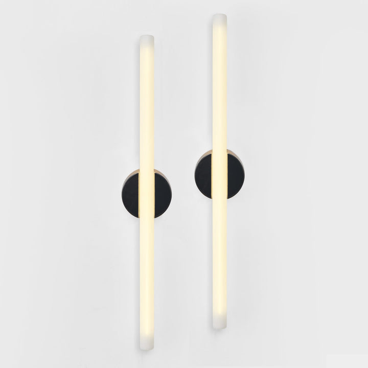 Modern wall sconces with frosted glass and matte black accents, minimalist design