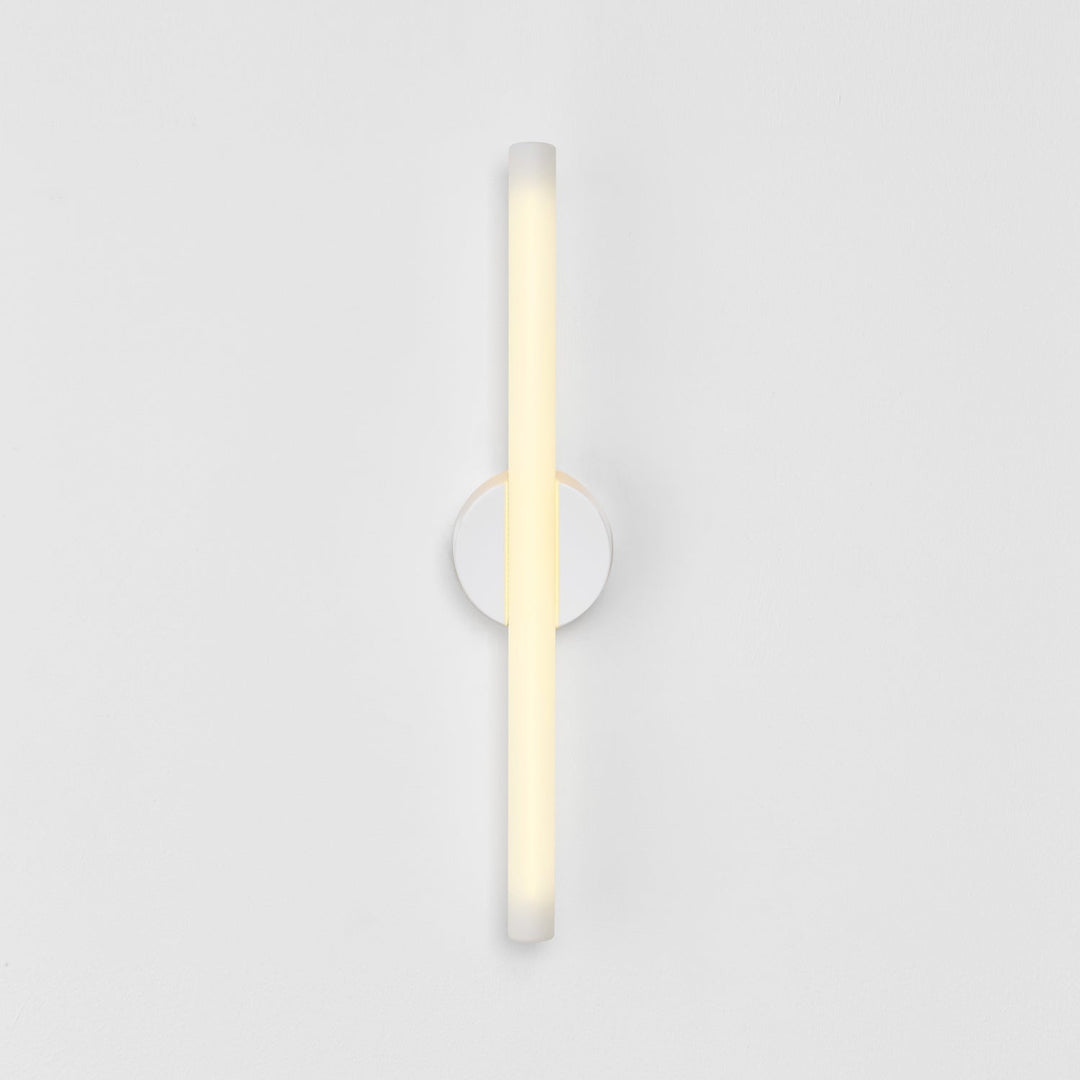 Minimalist frosted glass wall sconce with circular base, modern ambient lighting for contemporary interiors
