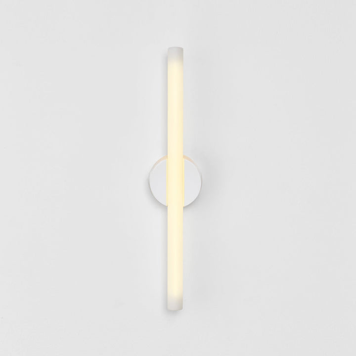 Minimalist frosted glass wall sconce with circular base, modern ambient lighting for contemporary interiors