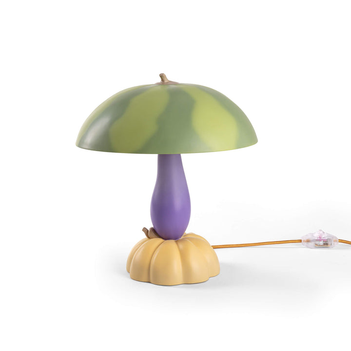 Seletti Vitamin Watermelon Table Lamp, table lamp with a watermelon shade on a purple aubergine stem and pumpkin base
