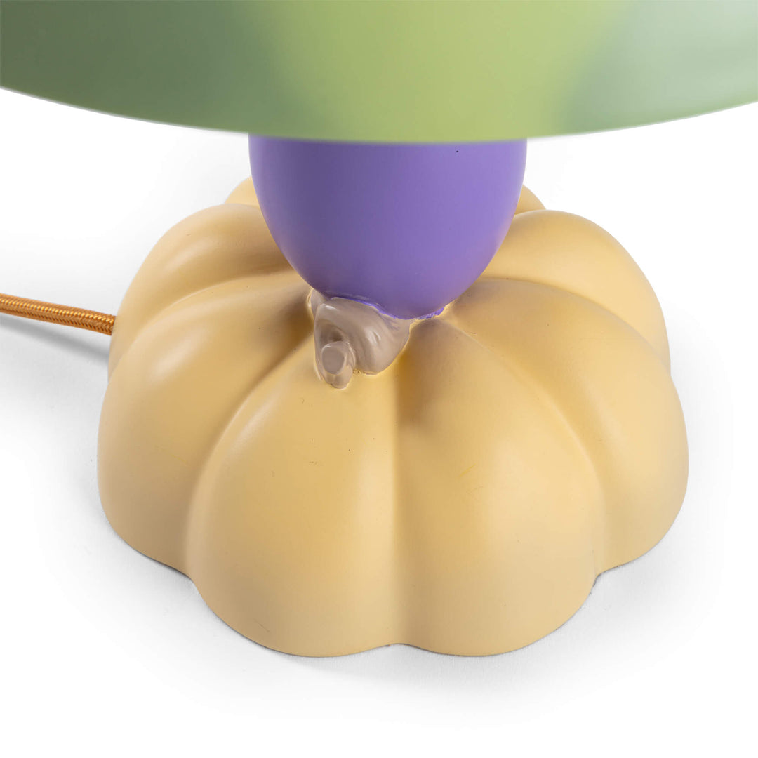 Seletti Vitamin Watermelon Table Lamp, close-up of the yellow pumpkin base and aubergine stem