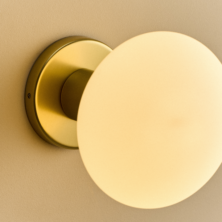 Lochan Wall Light in Brass + Oval Dim to Warm