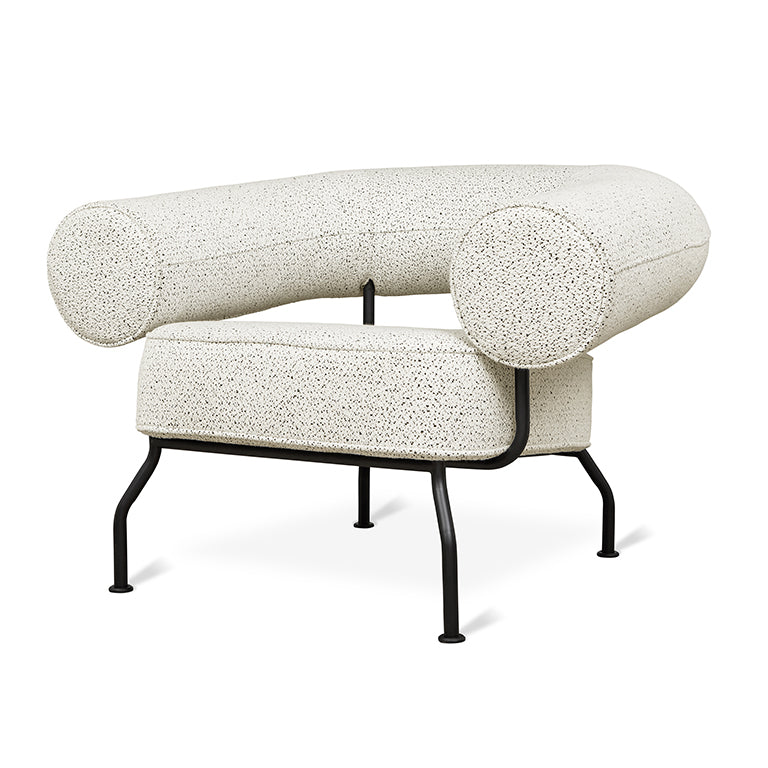 Elegant speckled armchair with sleek black metal legs, designer modern seating