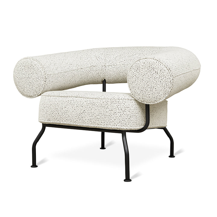 Elegant speckled armchair with sleek black metal legs, designer modern seating