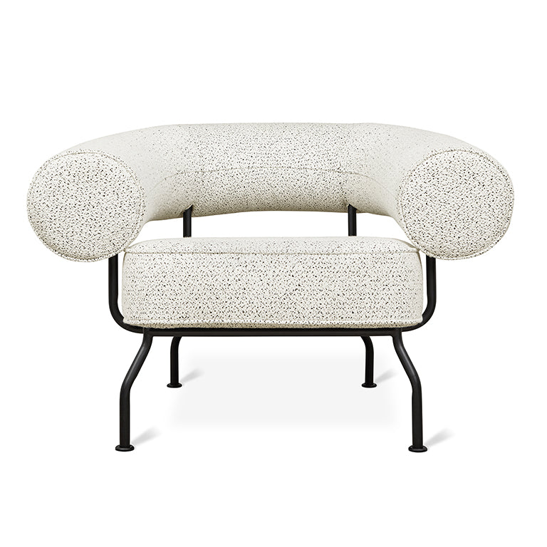Elegant speckled armchair with black metal frame, designer home furnishing