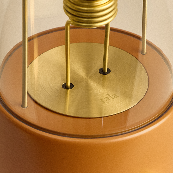 The Muse 2.0 Portable Lamp in Claycourt Orange