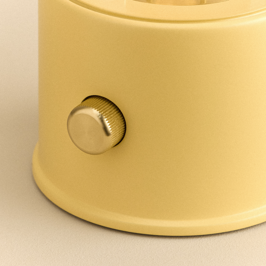 The Muse 2.0 Portable Lamp in Posset Yellow