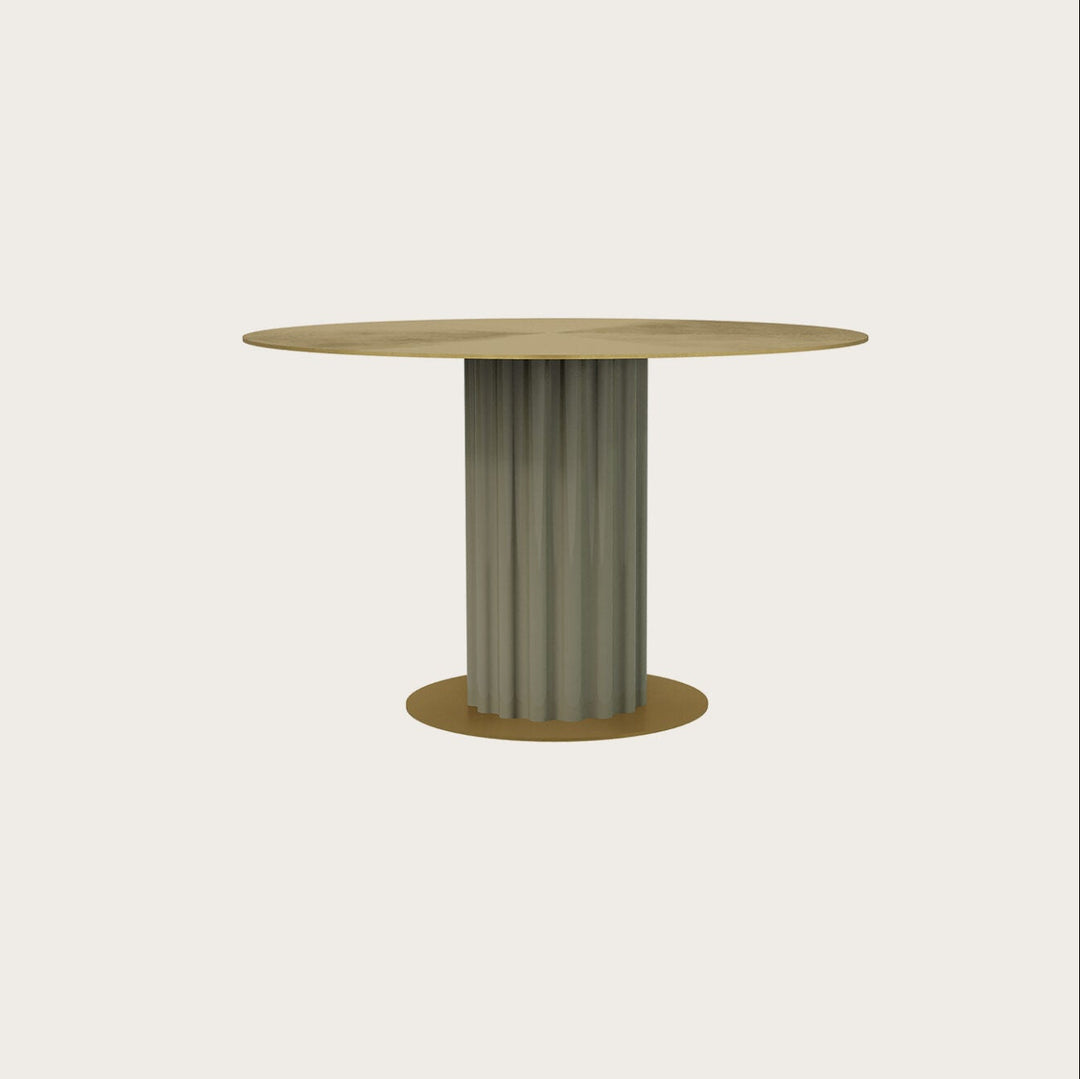 Round side table with ribbed cylindrical base on a light beige background