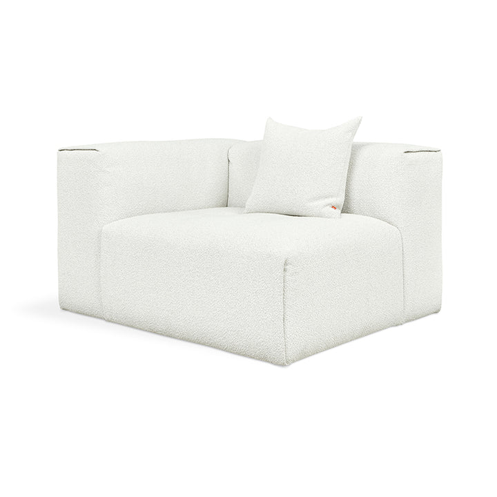 White bouclé armchair with plush cushion, modern minimalist design