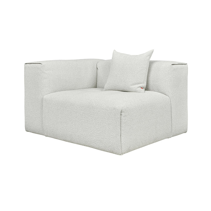 Textured white bouclé armchair with minimalist design and plush cushion