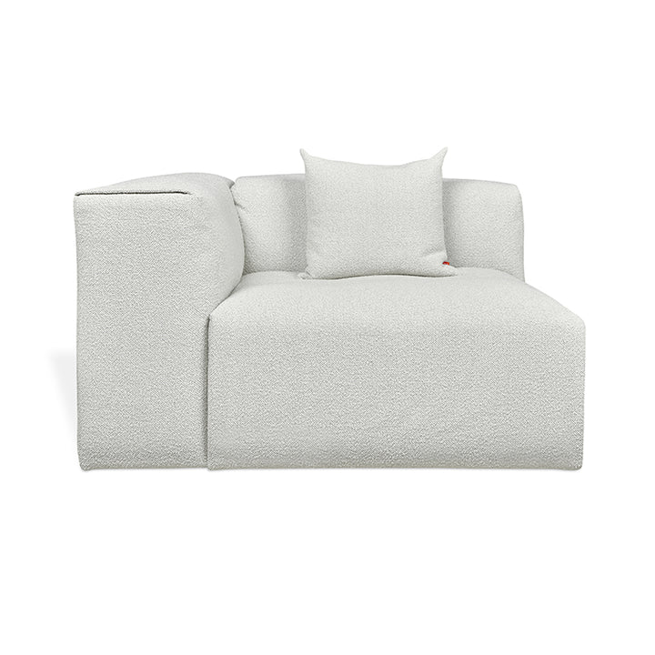 Textured bouclé chaise lounge with minimalist design and plush cushion
