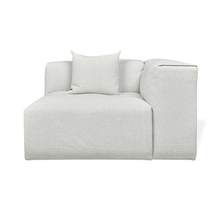 Textured white modular sofa with plush cushion, minimalist design