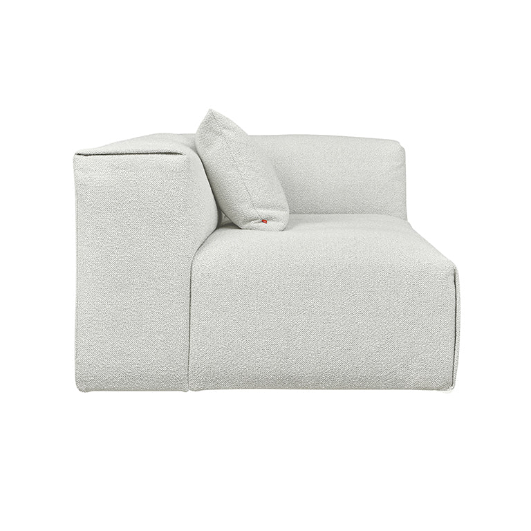 Modern modular sofa in textured light gray fabric, minimalist design with plush cushion