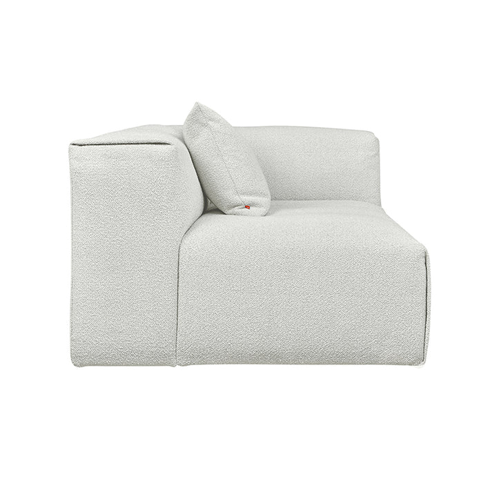 Modern modular sofa in textured light gray fabric, minimalist design with plush cushion