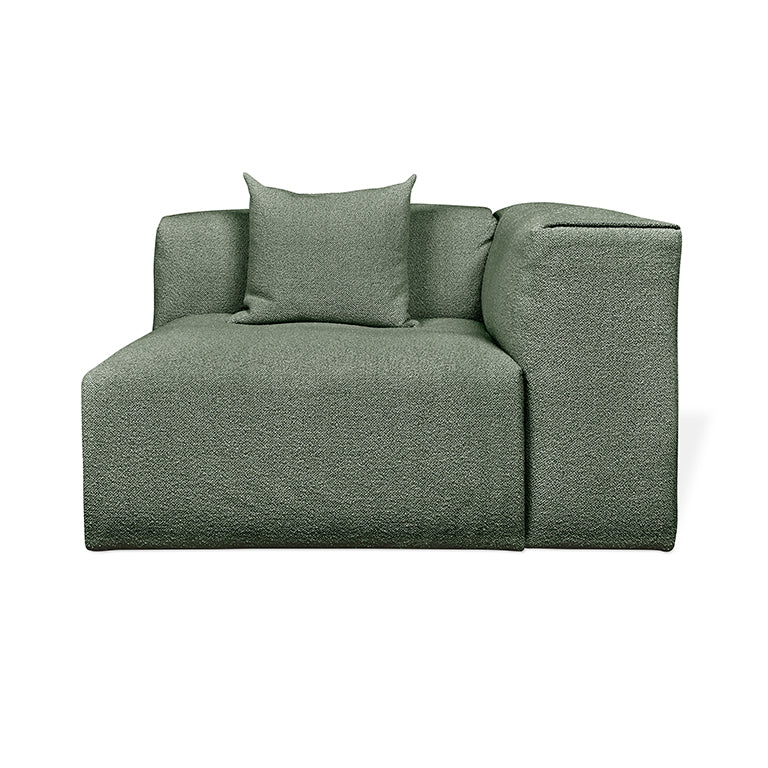 Sleek sage green modular sofa with textured fabric and plush cushion