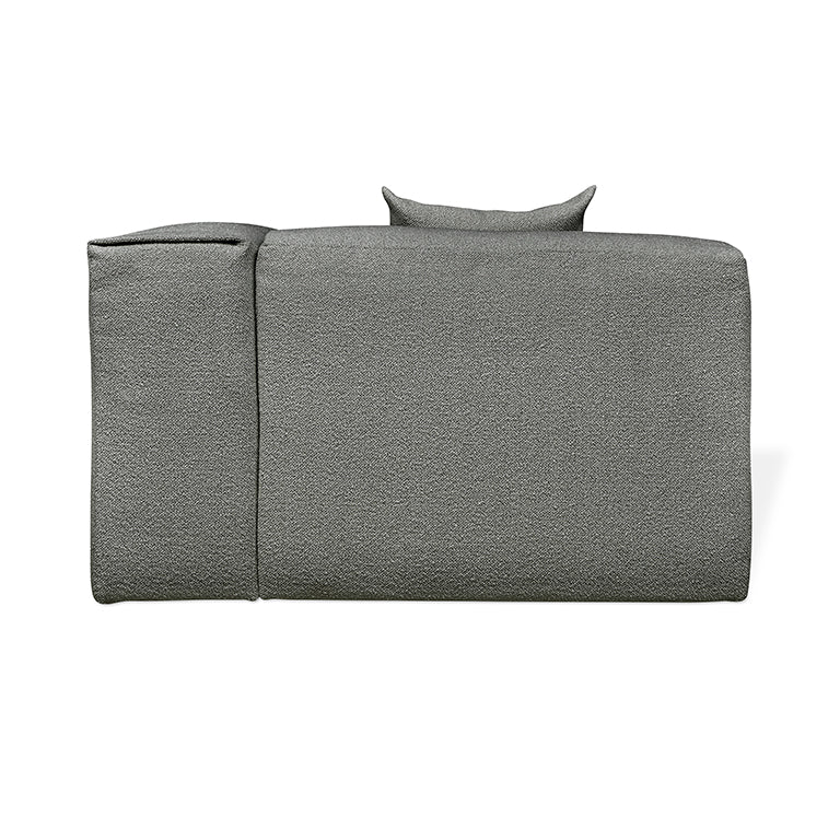 Gray textured modular sofa with sculptural backrest, modern designer furnishing