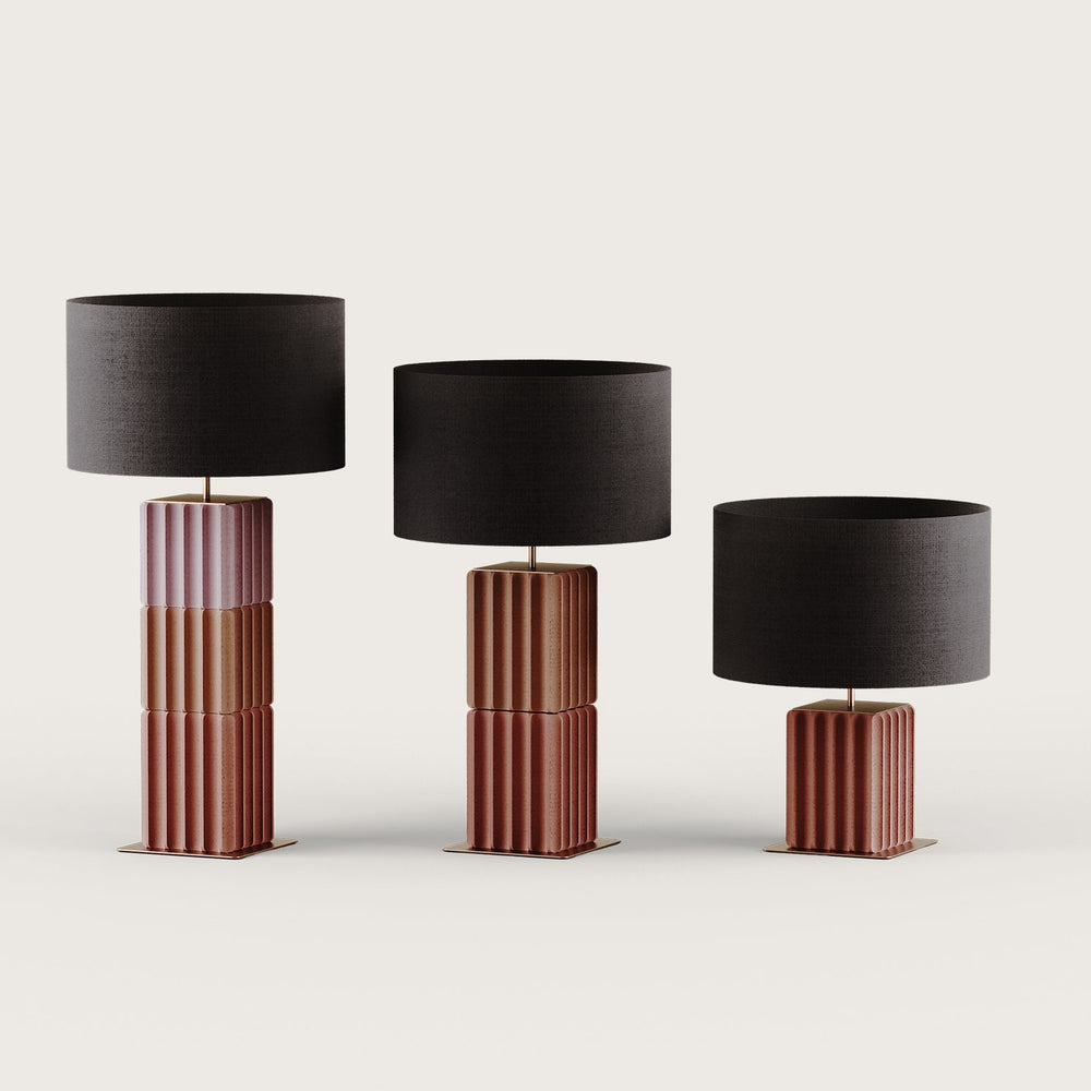Single, double and triple stacked fluted ceramic bases in pink and terracotta with black shades