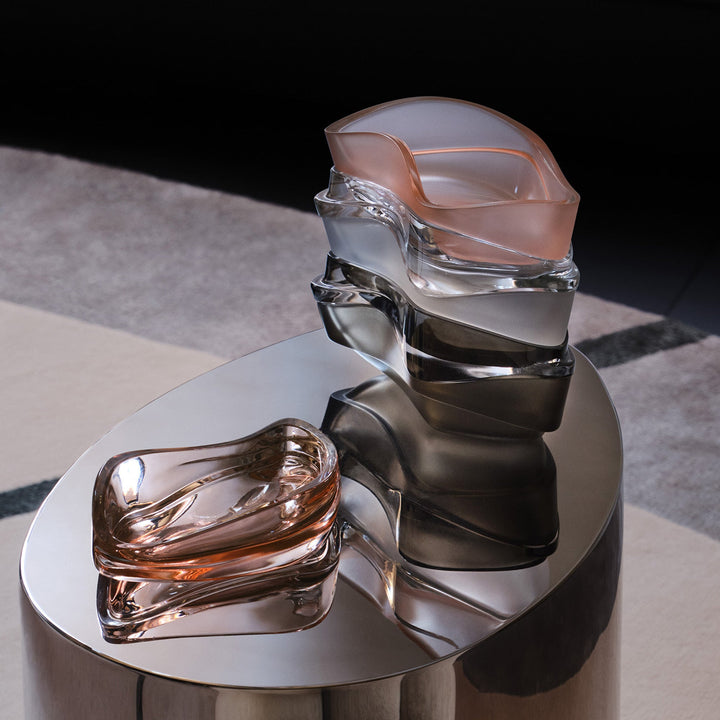 Plex Vessel, Set of 2 — Rose, clear and Smoke vessels stacked on a polished steel side table