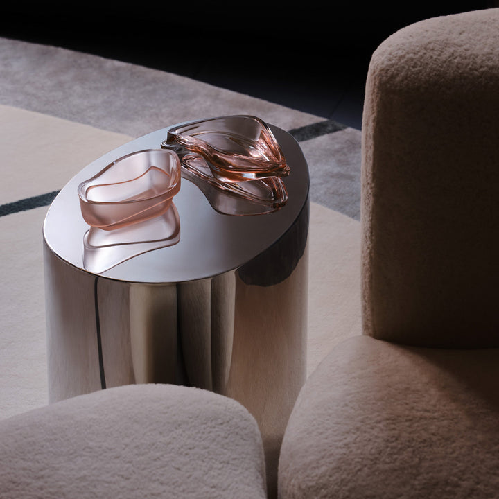 Plex Vessel, Set of 2 — Rose vessels set on a polished steel side table beside a boucle chair