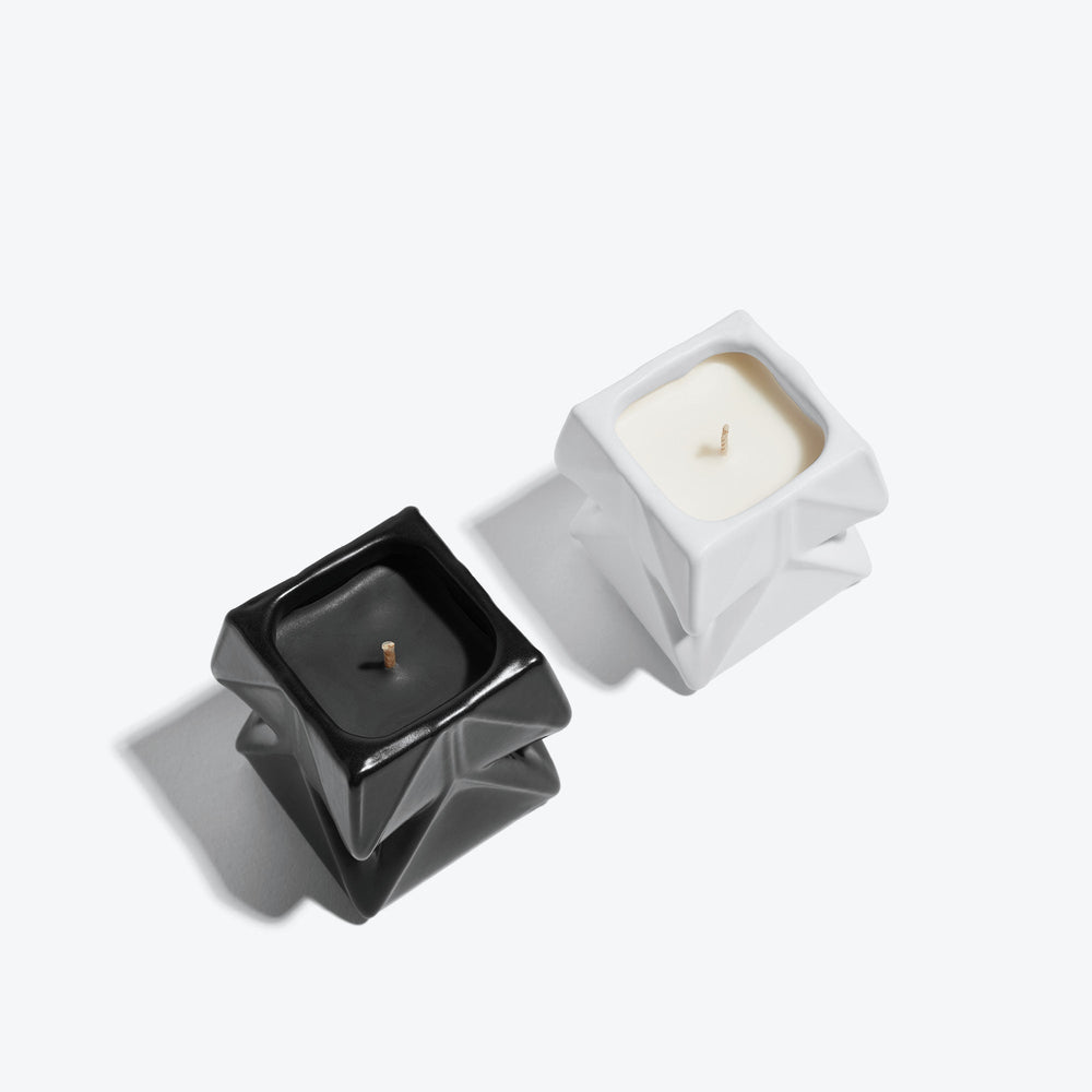 Prime Scented Candle Duo, Set of 2 — black and white candles from above showing the wax and wicks