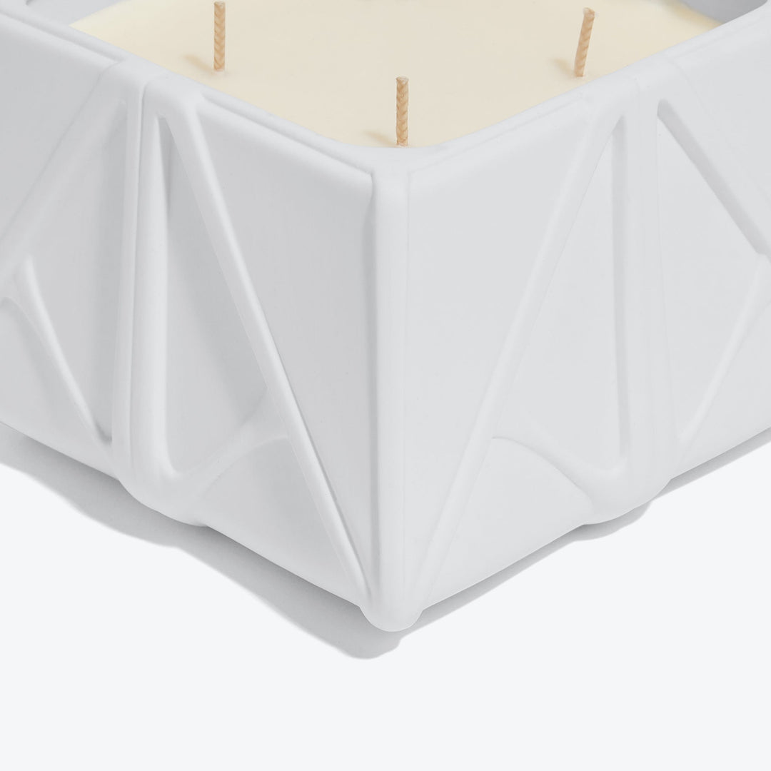 Prime Scented Candle — Large candle, close-up of the wicks and folded ceramic corner