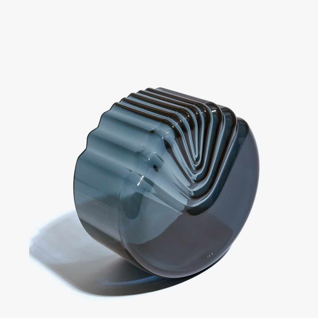 Pulse Bowl — Dark Blue glass bowl tipped on its side to show the ribbed exterior
