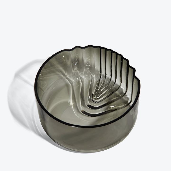Pulse Bowl — Smoke glass bowl, three-quarter view from above into the stepped interior