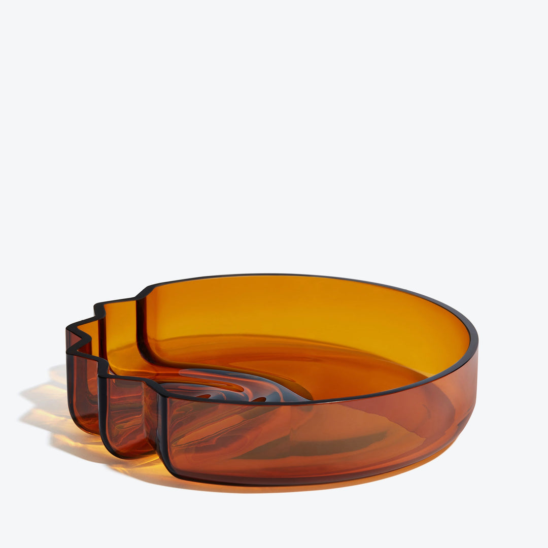 Pulse Platter — Amber glass platter with stepped wave edge, three-quarter view