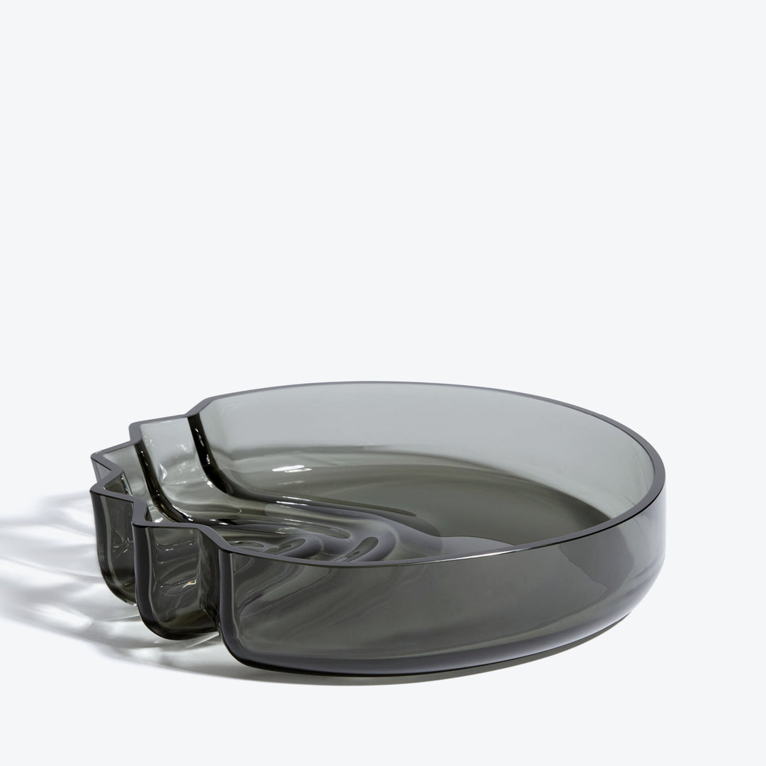 Pulse Platter — Smoke glass platter with stepped wave edge, three-quarter view