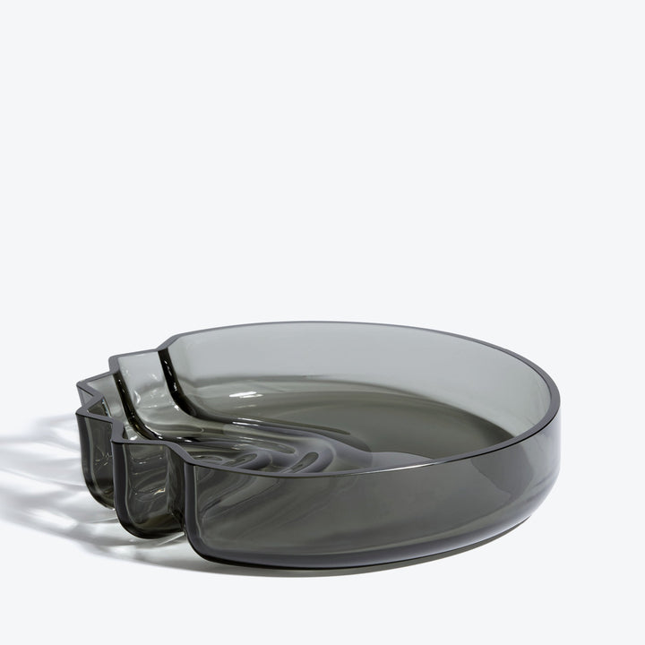 Pulse Platter — Smoke glass platter with stepped wave edge, three-quarter view
