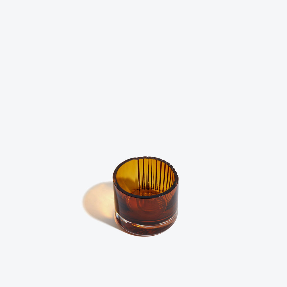 Pulse Tealight Holder X — amber tealight holder from above showing the ribbed interior