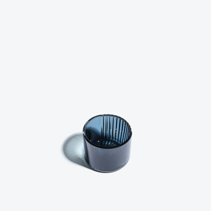 Pulse Tealight Holder X — dark blue tealight holder from above showing the ribbed interior