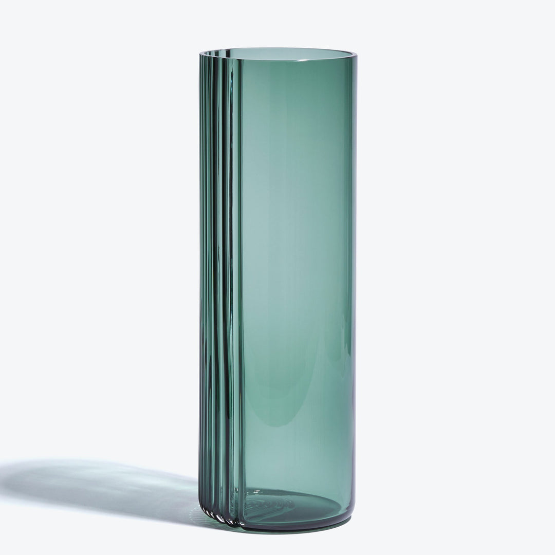 Pulse Vase — tall Grey Green glass vase, side view showing the ribbed edge on a white background