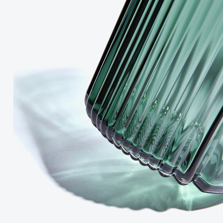 Pulse Vase — tall Grey Green glass, close-up of the ribbed base and cast shadow