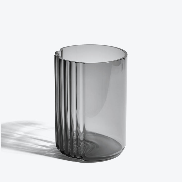 Pulse Vase — wide Smoke glass vase, side view showing the ribbed edge on a white background