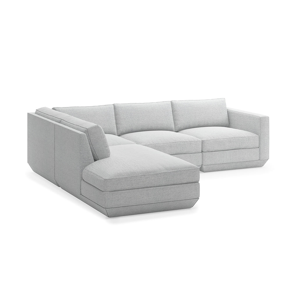 Modern gray sectional sofa with clean lines and plush cushions, designed for elegant living spaces