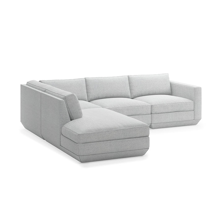 Modern gray sectional sofa with clean lines and plush cushions, designed for elegant living spaces