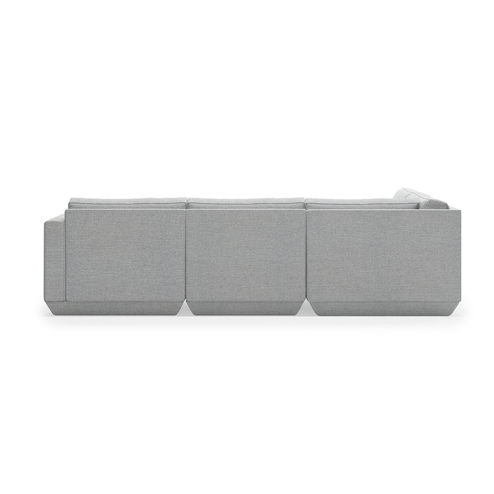 Modern gray modular sofa with clean lines and textured fabric