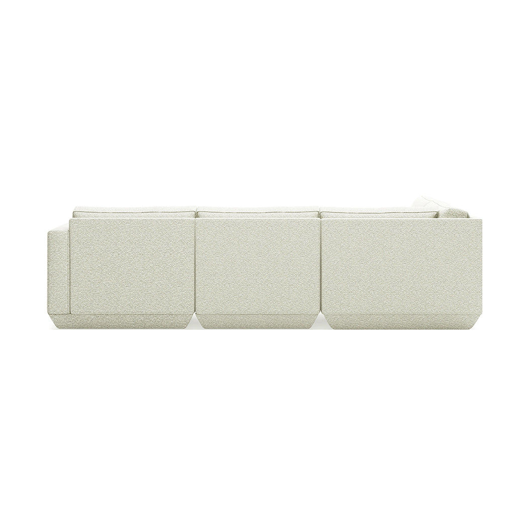 Elegant modular sofa in textured cream fabric, modern designer piece for refined interiors