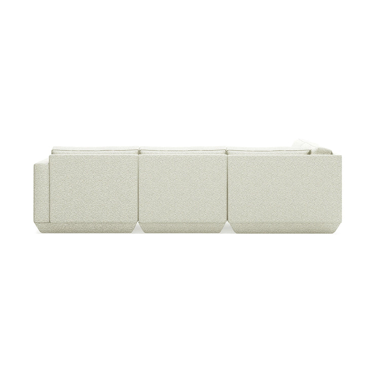 Elegant modular sofa in textured cream fabric, modern designer piece for refined interiors